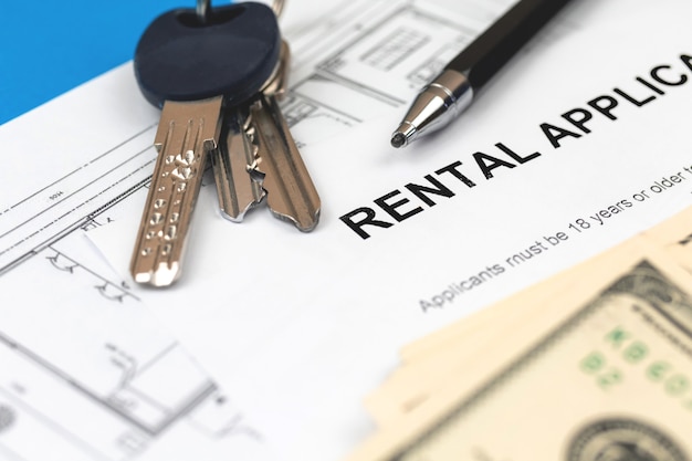 rental-agreement-document-office-table-pen-house-keys-money-close-up_526934-281.jpg